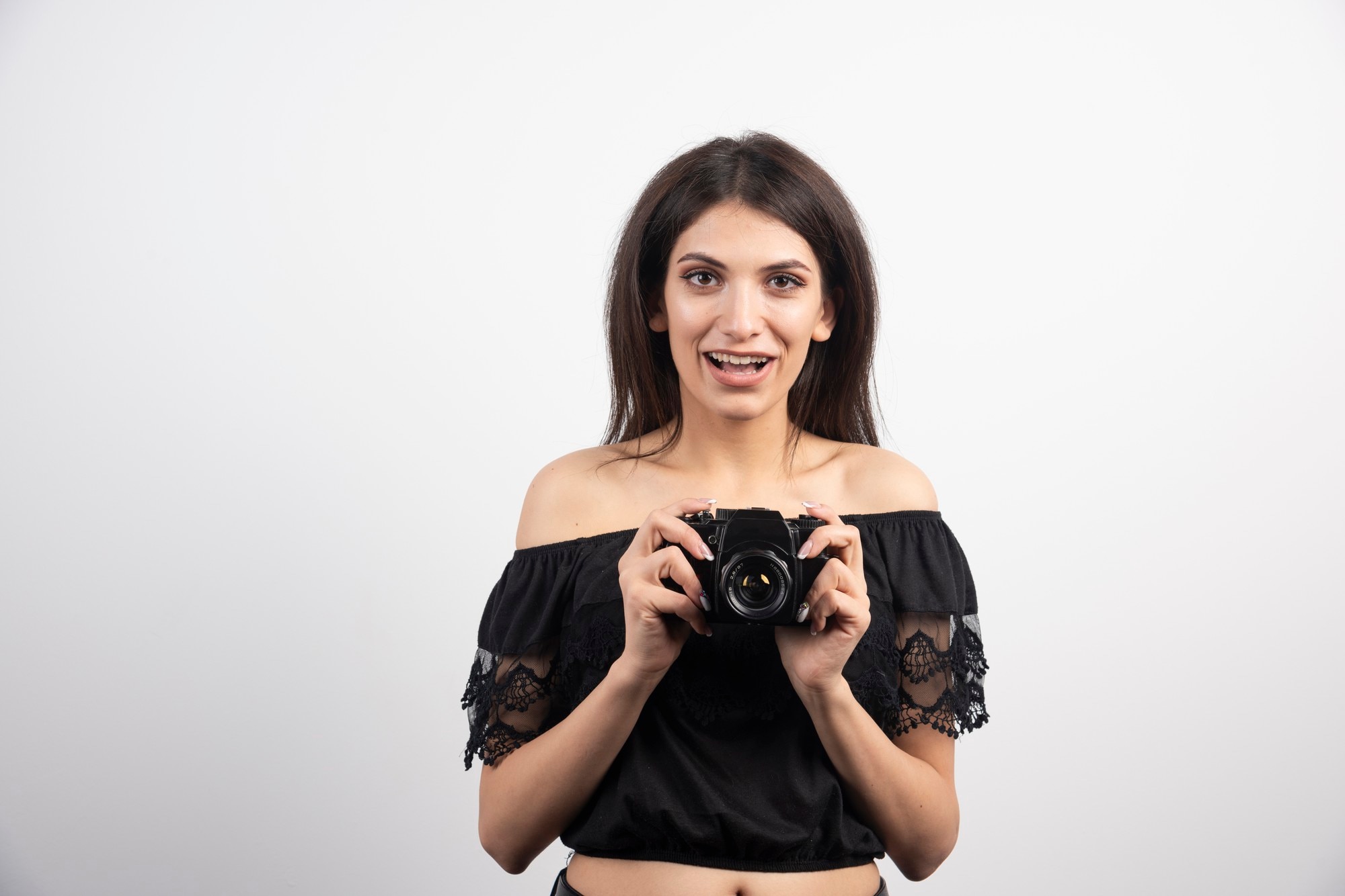 pretty-woman-posing-with-camera_114579-28622.jpg