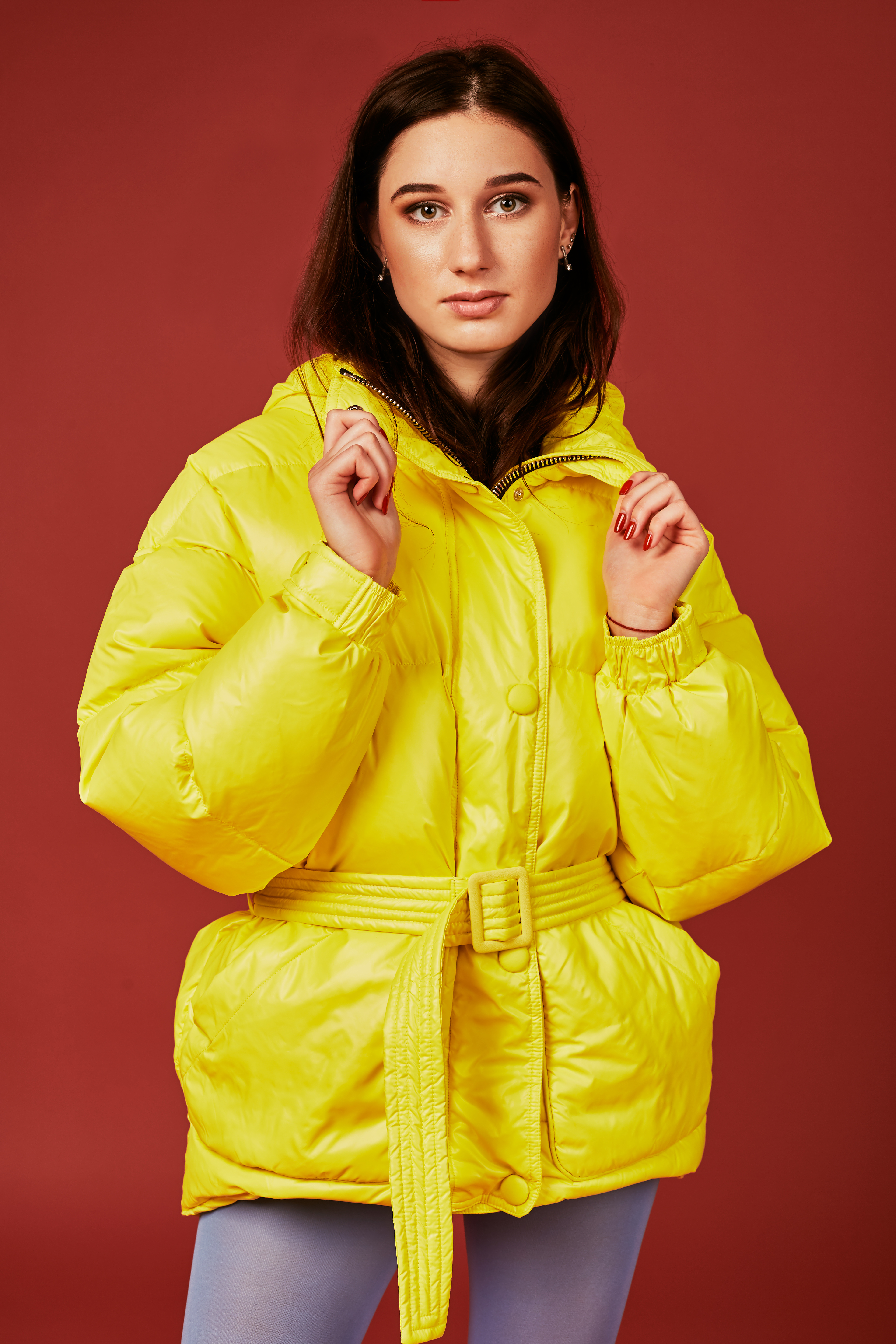 close-up-image-young-dark-haired-girl-posing-before-camera-studio-red-background-fashion-image-stylish-woman-wearing-yellow-jacket.jpg