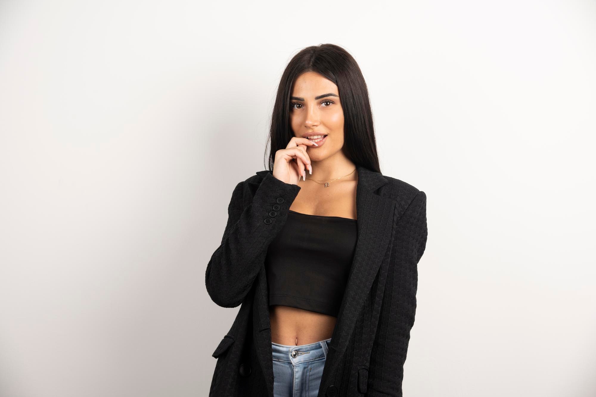 elegant-woman-posing-white-background-high-quality-photo_114579-52905.jpg