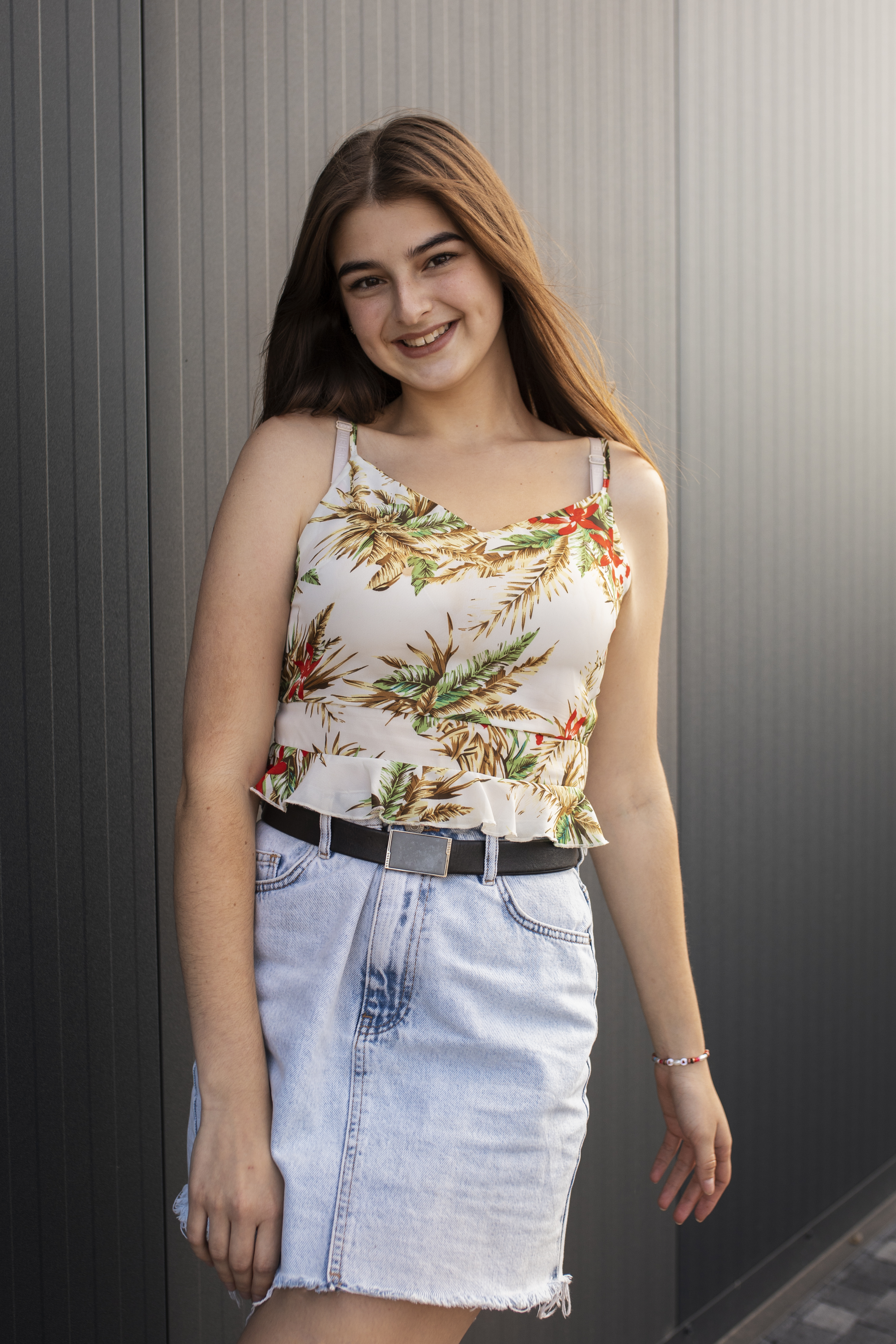 young-teenage-girl-recording-reels-herself-outdoors-social-media.jpg